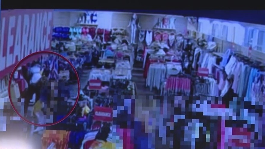 Video shows moment suspect allegedly pulled gun in Surf store